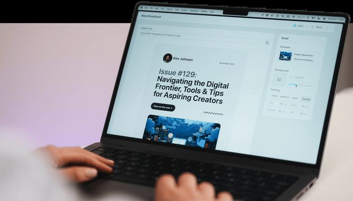 A laptop opened to the Kit Broadcast page in the app
