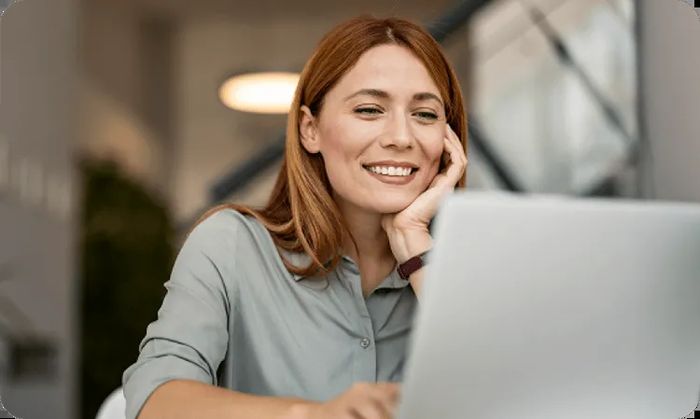 NordPass - women with laptop